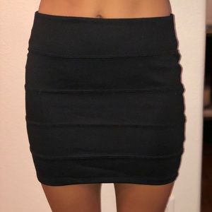 Black ribbed mini pencil skirt